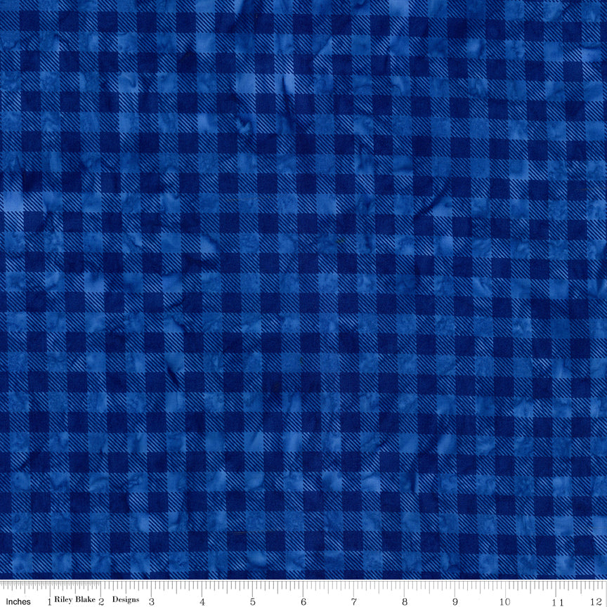Blue checkered fabric pattern with a visible brand label at the bottom.