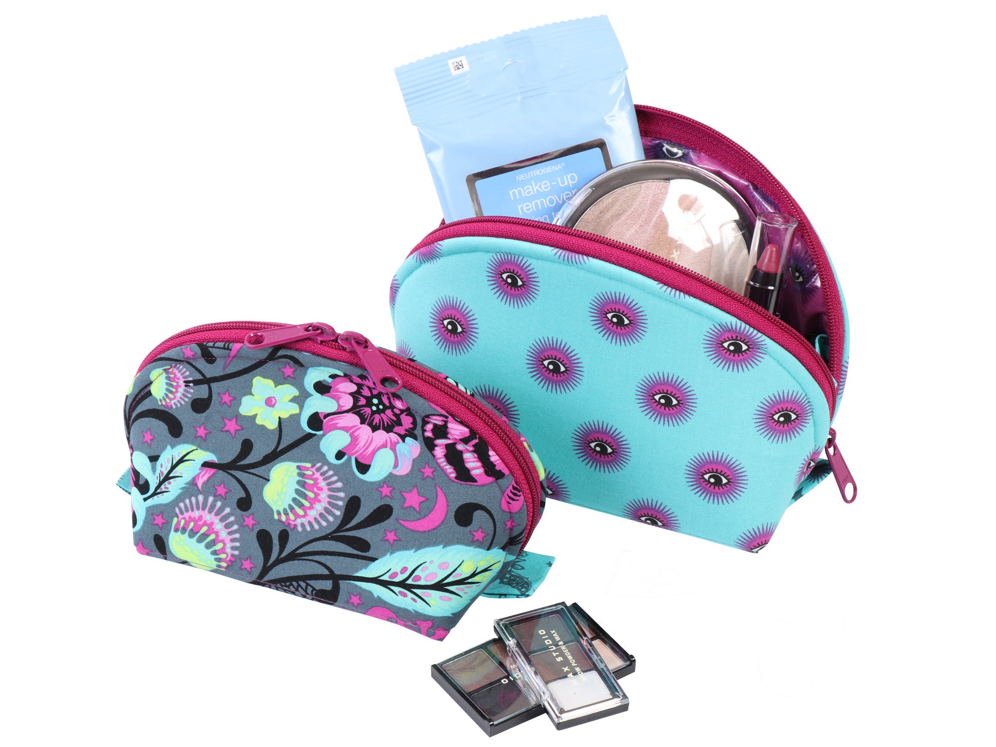 Two colorful zippered pouches with cosmetic items on a white background
