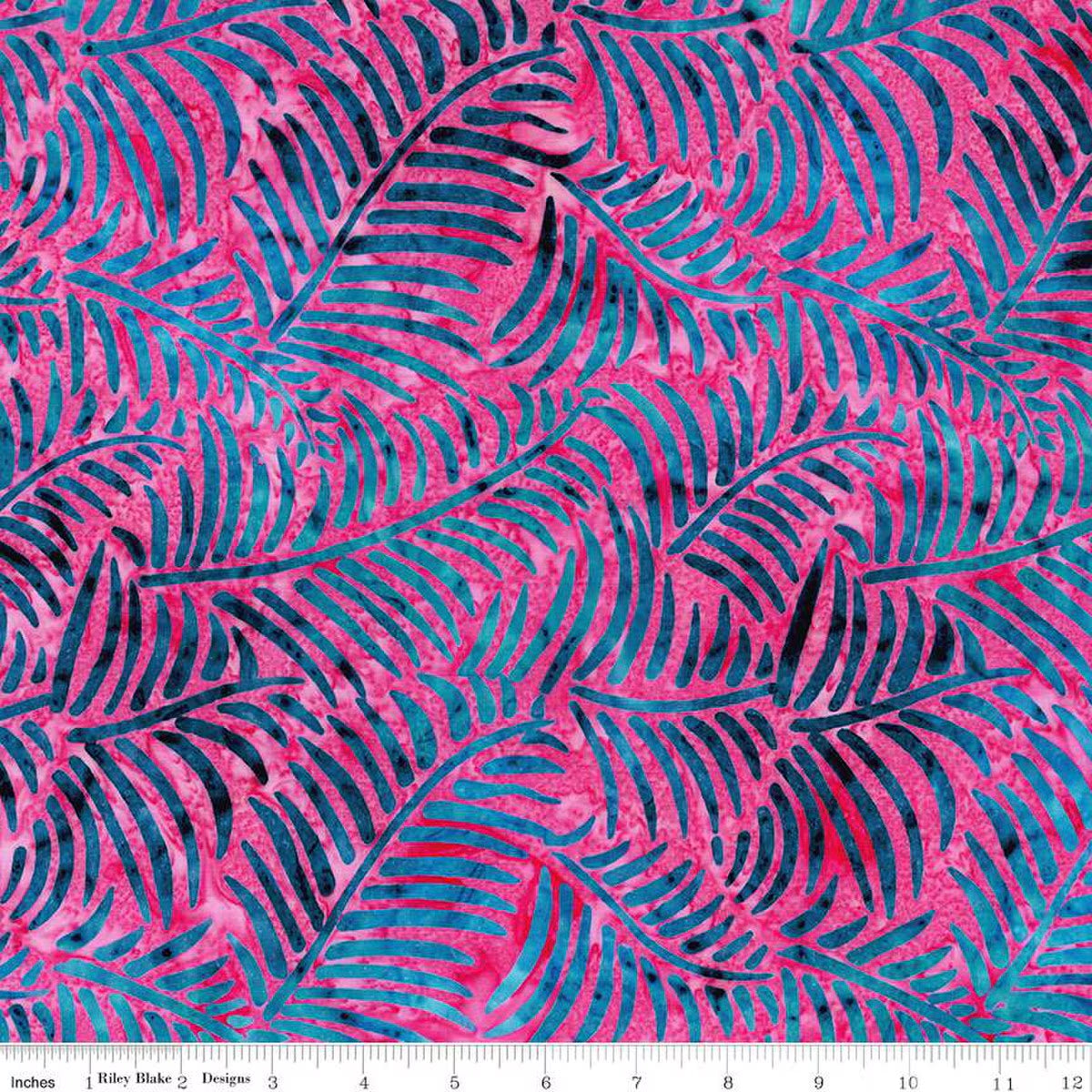 Batik fabric with pink and blue leaf pattern alongside a scale ruler