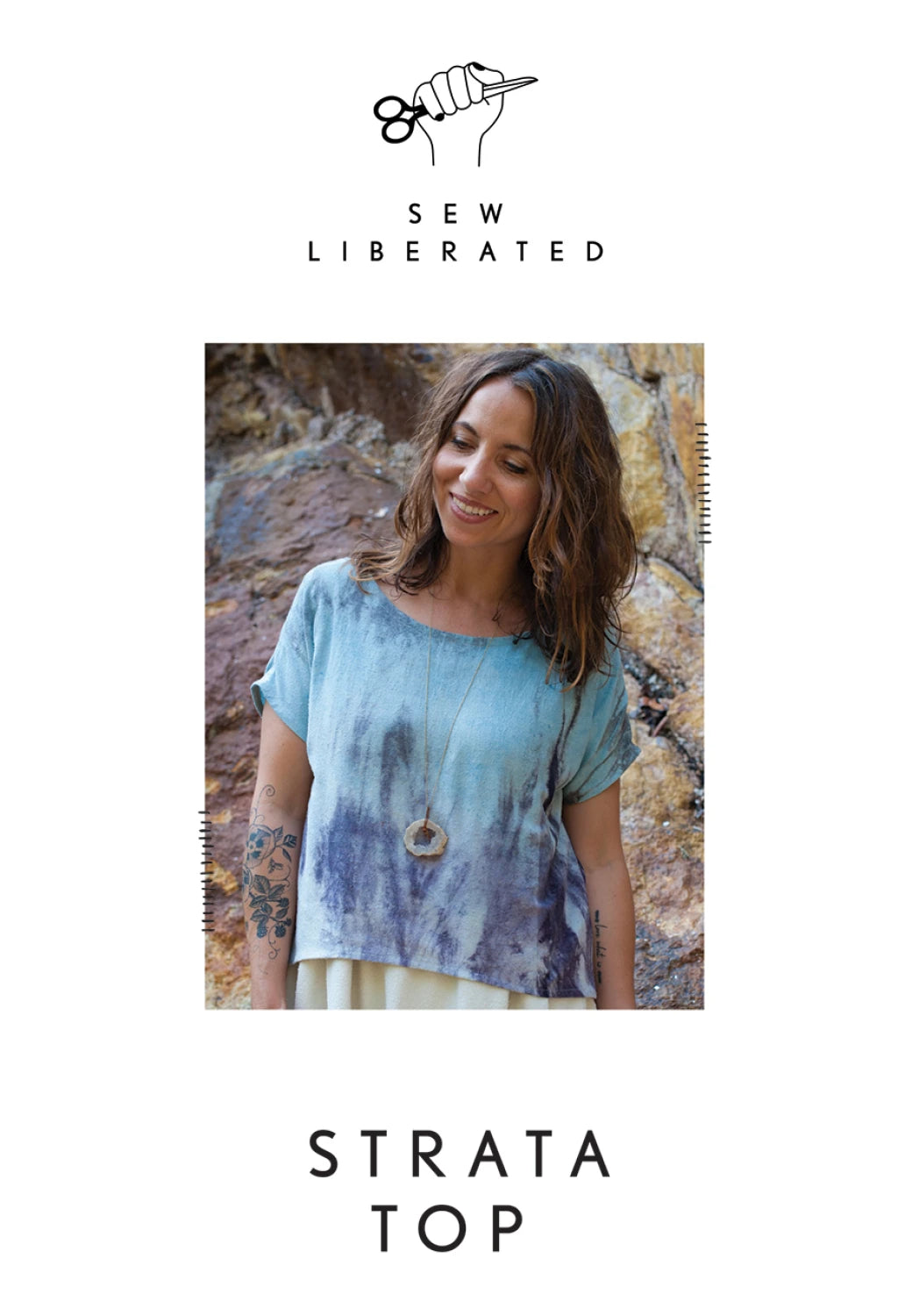 Front of the pattern for Sew Liberated  Strata short sleeved top, shown on a woman. 
